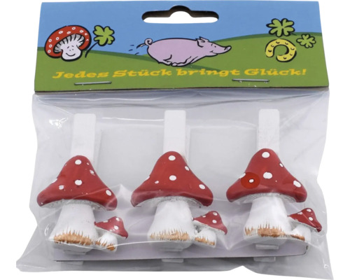 Drei Holzklammern mit Fliegenpilz Motiv in einer Kunststoffverpackung als Dekoration oder Bastelzubehör.