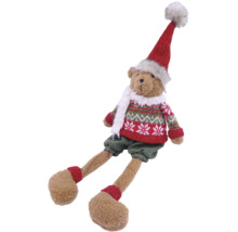 Weihnachts-Teddybär mit Strickpullover, Weihnachtsmütze, Schal und langen Beinen. Dekorative Plüschfigur für Weihnachten.