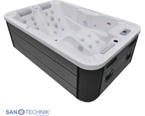Rechteckiger Außen-Whirlpool mit grauer Verkleidung in Holzoptik, weißer Innenwanne, Massagedüsen, Kopfstützen und Bedienelement.