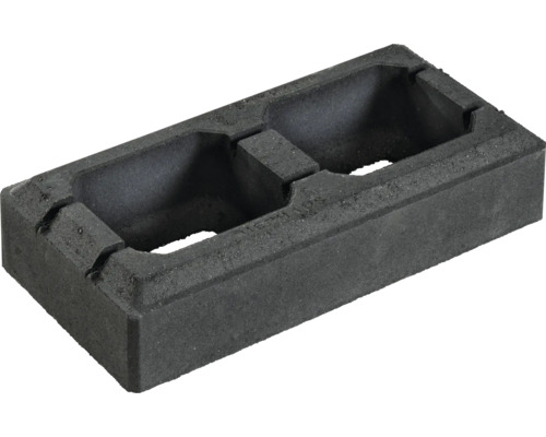 Schalungsstein aus Beton mit zwei Kammern für den Mauerbau.