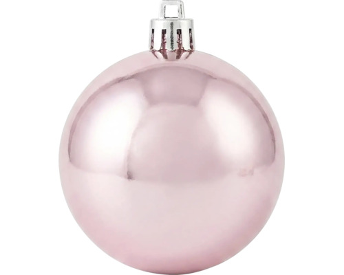 Glänzende rosa Christbaumkugel mit silberner Aufhängung.