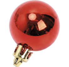 Glänzende rote Christbaumkugel mit goldener Kappe.