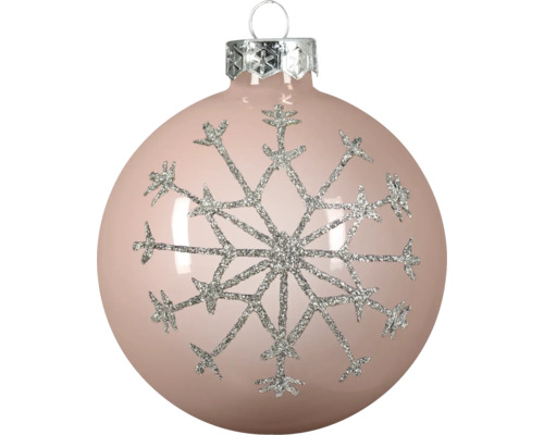Weihnachtskugel aus Glas mit einer glitzernden silbernen Schneeflocke, pfirsichfarben.