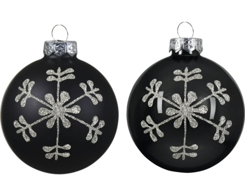 Zwei schwarze Weihnachtskugeln mit silbernem Glitzer-Schneeflocken-Motiv, eine matt und eine glänzend.