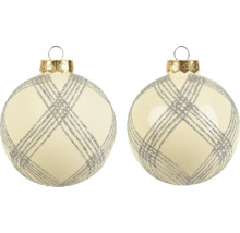 Weihnachtskugeln aus Glas in Creme mit silbernem Glitzer-Gittermuster und goldener Kappe.