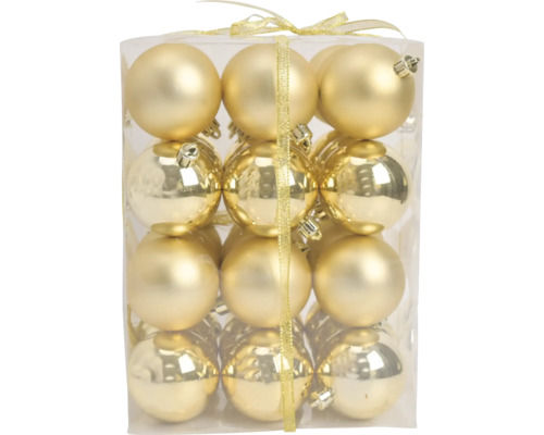 Set aus goldenen Weihnachtskugeln mit matter und glänzender Oberfläche in einer Klarsichtbox mit Schleifenband.