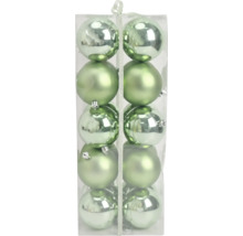Set aus grünen Weihnachtskugeln in matt und glänzend, verpackt in einer transparenten Box.