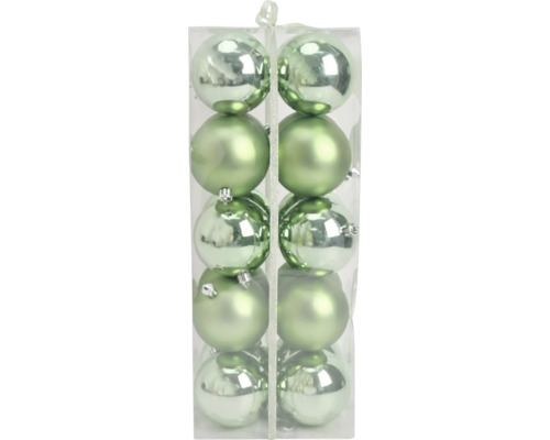 Set aus grünen Weihnachtskugeln in matt und glänzend, verpackt in einer transparenten Box.