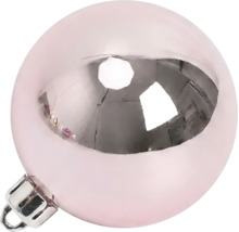 Rosa Christbaumkugel aus Glas mit silbernem Reflektor.