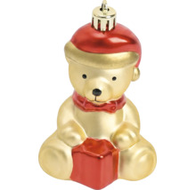 Christbaumschmuck in Form eines sitzenden Teddybären mit Weihnachtsmütze und Geschenk.