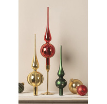 Christbaumspitzen und Christbaumkugeln in Rot, Gold und Grün mit Glitzer und Mustern.
