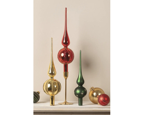 Christbaumspitzen und Christbaumkugeln in Rot, Gold und Grün mit Glitzer und Mustern.