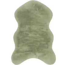Grüner Kunstfellteppich in Lammfellform.