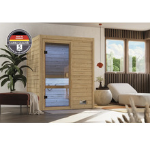 Karibu Elementsauna aus Holz in einem modernen Wohnraum mit Glasfront und Siegel für deutsche Qualität sowie fünf Jahre Garantie auf Konstruktion.