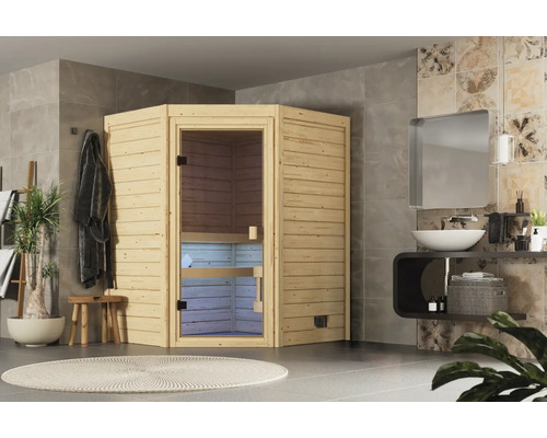 Ecksauna aus Holz mit Glastür in einem modern eingerichteten Badezimmer mit Waschbecken und Spiegel.