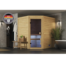 Ecksauna aus Massivholz in einem modern eingerichteten Badezimmer mit Glasfront und Karibu Qualitätssiegel inklusive fuenf Jahren Garantie.