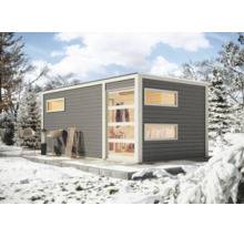 Moderne Garten-Sauna mit Flachdach und großen Fensterfronten in einer verschneiten Winterlandschaft.