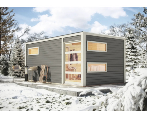 Moderne Garten-Sauna mit Flachdach und großen Fensterfronten in einer verschneiten Winterlandschaft.