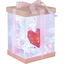 Geschenkbox mit Schleife, beleuchteten Diamanten und Herz im Inneren