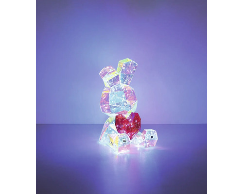 Leuchtende LED-Dekofigur in Form eines sitzenden Hasen mit geometrischem Design, der ein Herz hält.