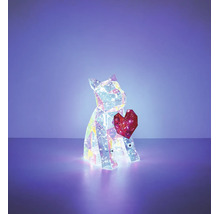 Leuchtende geometrische Hundefigur in Kristall-Optik mit einem Herz