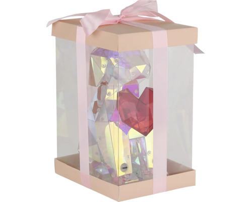 Geschenkbox mit einer transparenten Figur, die einen Hund mit Herz darstellt, verziert mit einer Schleife.