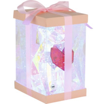 Geschenkbox mit Schleife und integrierter Beleuchtung sowie einem Herz im Inneren