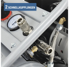 Detailansicht eines Kompressors mit zwei Schnellkupplungen und einem Manometer.