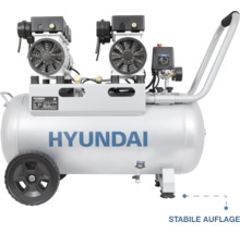 Hyundai Logo auf einem Druckluftkompressor mit zwei Motoreinheiten, Druckkessel, Rädern und Handgriff für eine stabile Auflage.