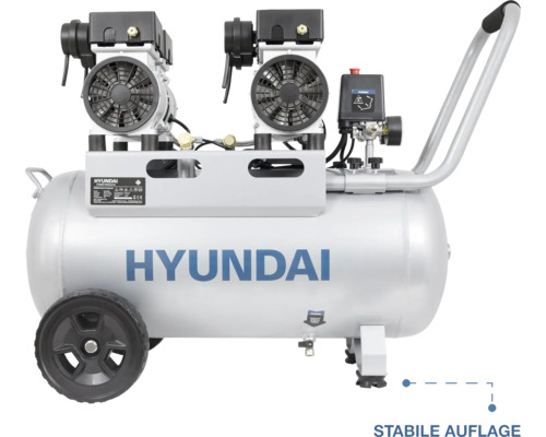 Hyundai Logo auf einem Druckluftkompressor mit zwei Motoreinheiten, Druckkessel, Rädern und Handgriff für eine stabile Auflage.
