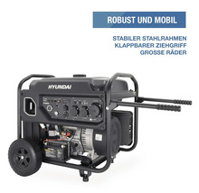 Hyundai Stromerzeuger mit stabilem Stahlrahmen, klappbarem Ziehgriff und großen Rädern für die mobile Stromversorgung.