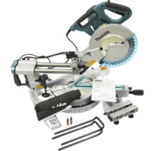 Makita Kapp- und Gehrungssäge mit Zubehör wie Staubsack, Schraubzwinge und Bedienungsanleitung.