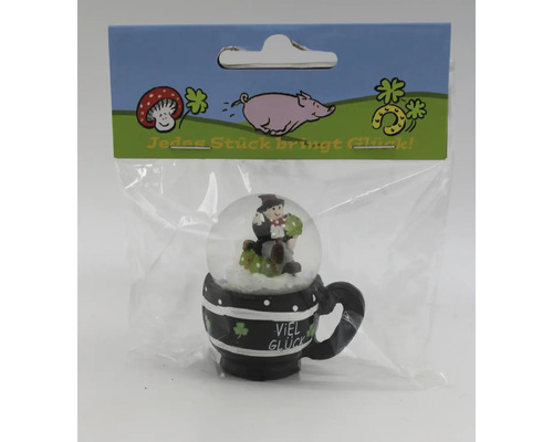 Schneekugel als Glücksbringer in Form einer Tasse mit Schornsteinfeger Figur in Kunststoffverpackung mit Aufdruck Jedes Stück bringt Glück