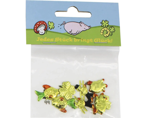 Glücksbringer Set mit kleinen dekorativen Symbolen wie Schwein, Kleeblatt und Schornsteinfeger in einer Kunststoffverpackung.