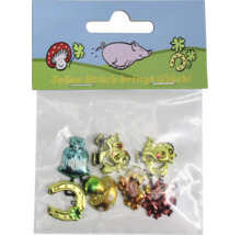 Set mit metallischen Glücksbringer-Figuren in einer Plastikverpackung mit der Aufschrift Jedes Stück bringt Glück.