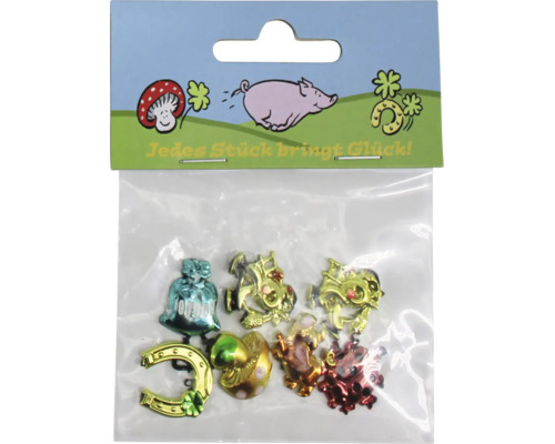 Set mit metallischen Glücksbringer-Figuren in einer Plastikverpackung mit der Aufschrift Jedes Stück bringt Glück.