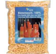 Eine Packung mit 500 Gramm Bienenwachs Pastillen von Hobby Time zur Herstellung von Kerzen.