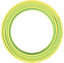Ringförmig aufgewickelte gelb grüne Erdungsleitung als Elektrokabel