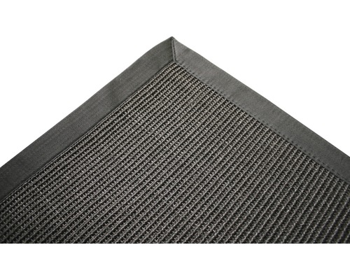 Detailansicht eines Teppichs mit Textilbandeinfassung