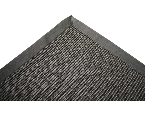 Detailansicht eines gewebten Teppichs mit Bordüre