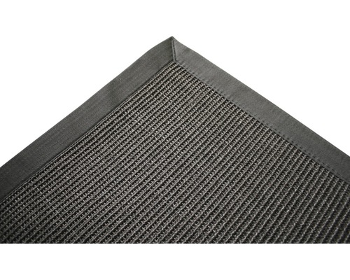 Detailansicht eines gewebten Teppichs mit Bordüre