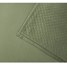 Nahaufnahme einer gesteppten Tagesdecke mit quadratischem Muster