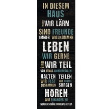 Dekoratives Schild mit dem Spruch: In diesem Haus.