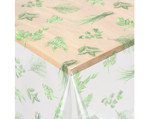 Tischdecke Crystal Kräuter grün 140 cm breit (Meterware) Transparente Tischdecke mit Kräutermuster auf einem Holztisch