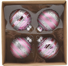 Vier Christbaumkugeln mit Streifenmuster in einer Box