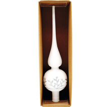 Weihnachtsbaumspitze mit Pflanzenmuster in Verpackung