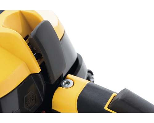 Detailansicht einer gelben und schwarzen Säge mit Stop-Symbol