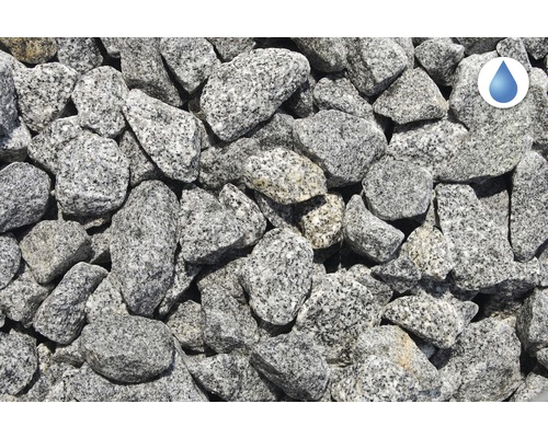Nahaufnahme von Granit Ziersplitt mit Wasserdurchlässigkeitssymbol