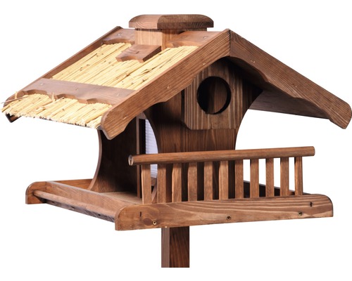 Vogelhaus aus Holz mit Strohdach