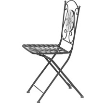 Klappbarer Gartenstuhl aus Metall mit Mosaikdetail im Rückenbereich.
